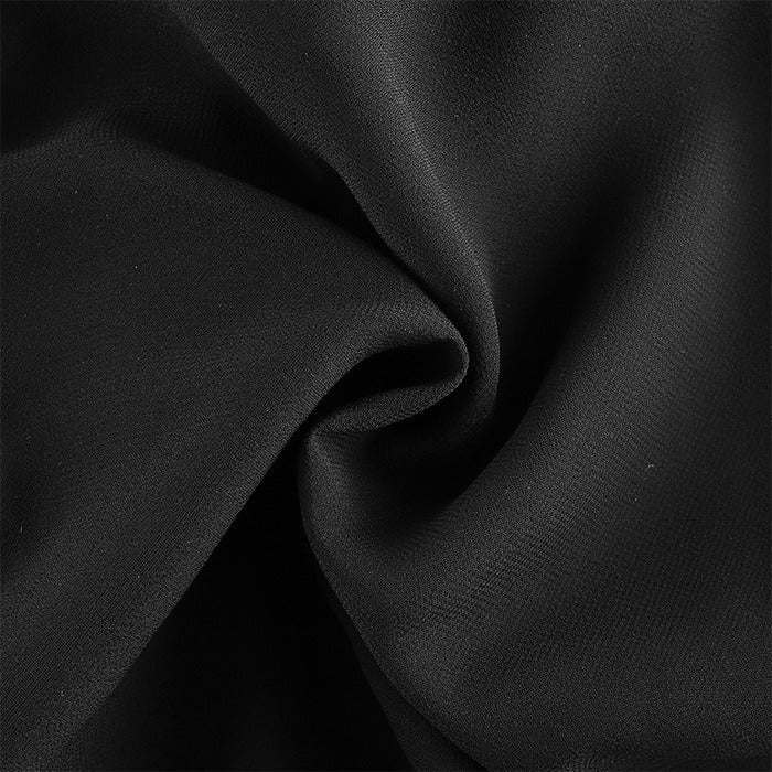 Close-up of soft black fabric, perfect for gothic summer mini dresses and alternative fashion.