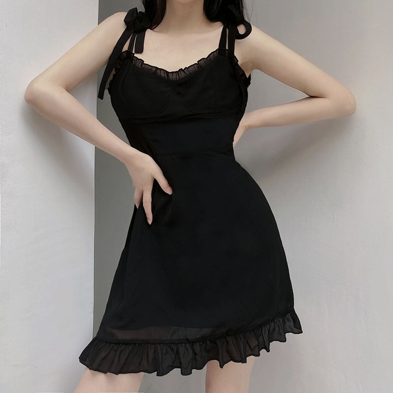 Gothic black summer mini dress with lace decorations and bow straps, perfect for alternative fashion styles.