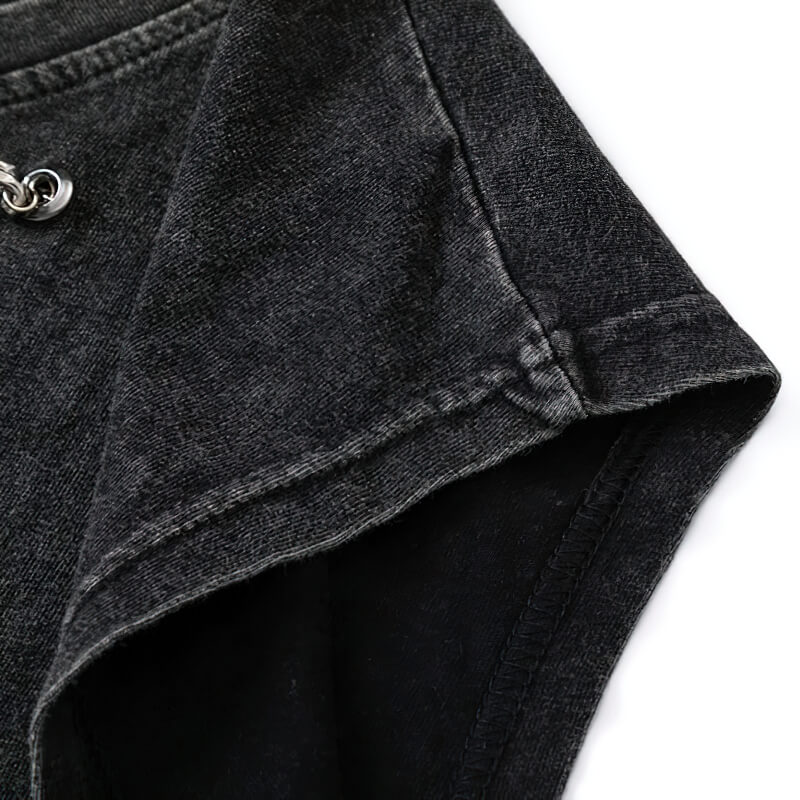 Close-up of our gothic style women's ripped tank top showing sleeve and chain detail.