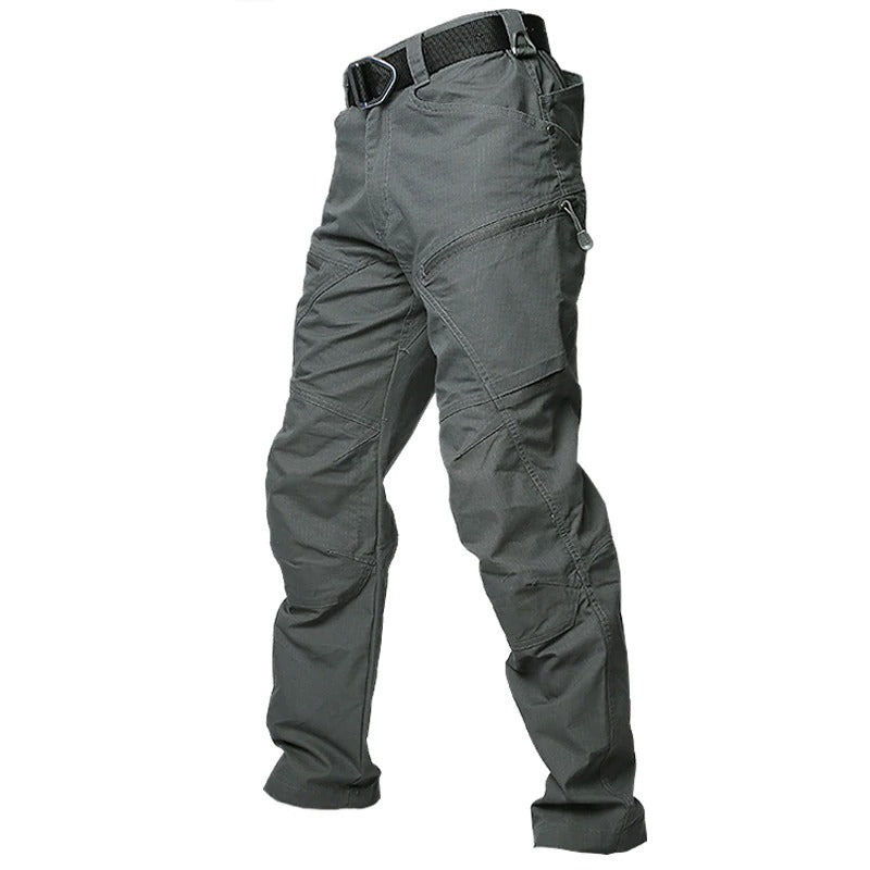 Tactical men's military-style cargo pants in gray-green with multiple pockets, ideal for hunting and outdoor activities.