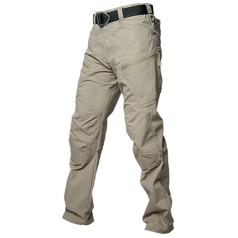 Tactical men's military-style pants with multiple pockets in a light brown color, ideal for hunting and outdoor activities.