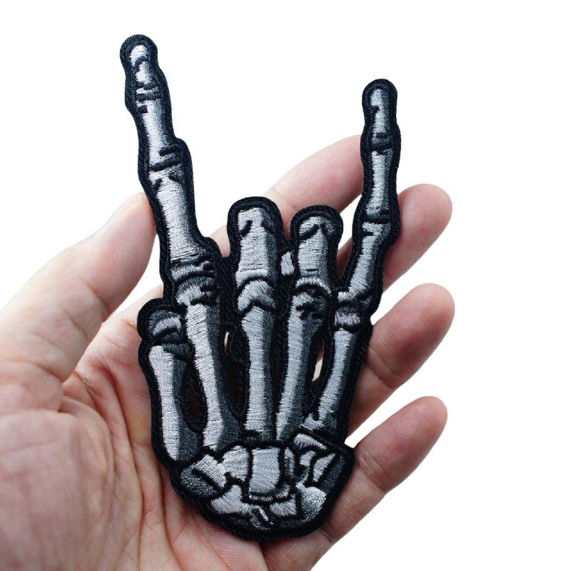 Skeleton hand patch in heavy metal style, perfect unisex casual accessory for clothes.