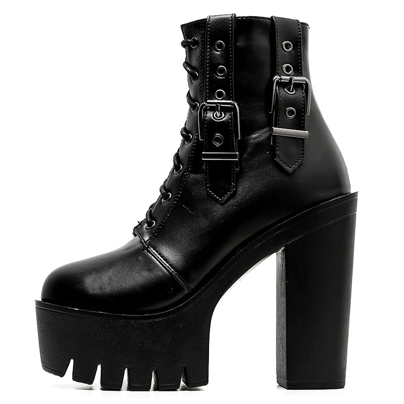 Thick high heel black lace-up ankle goth boots with stylish buckles and a chunky platform.