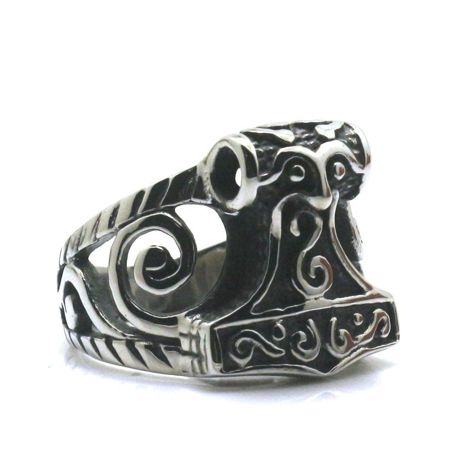 Vintage Thor's Hammer ring made of stainless steel, featuring intricate Nordic designs and hollow out style.