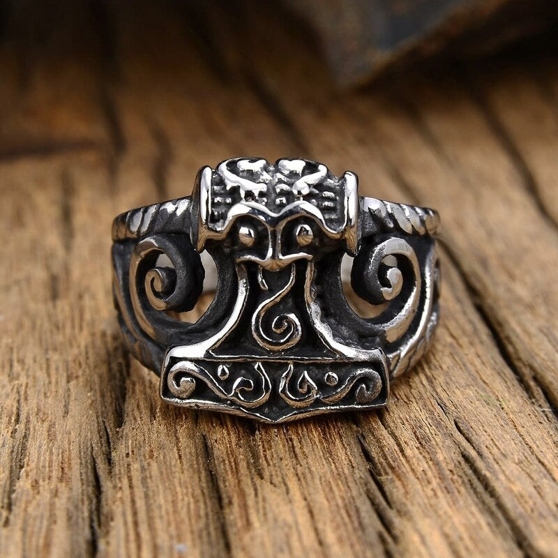 Vintage Thor's Hammer ring in stainless steel, featuring intricate Nordic designs, perfect for both men and women.