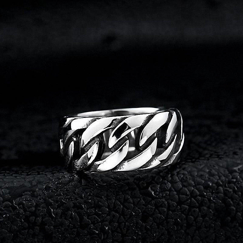 Titanium steel biker chain ring showcasing a unique twisted design, perfect for stylish rock accessories.