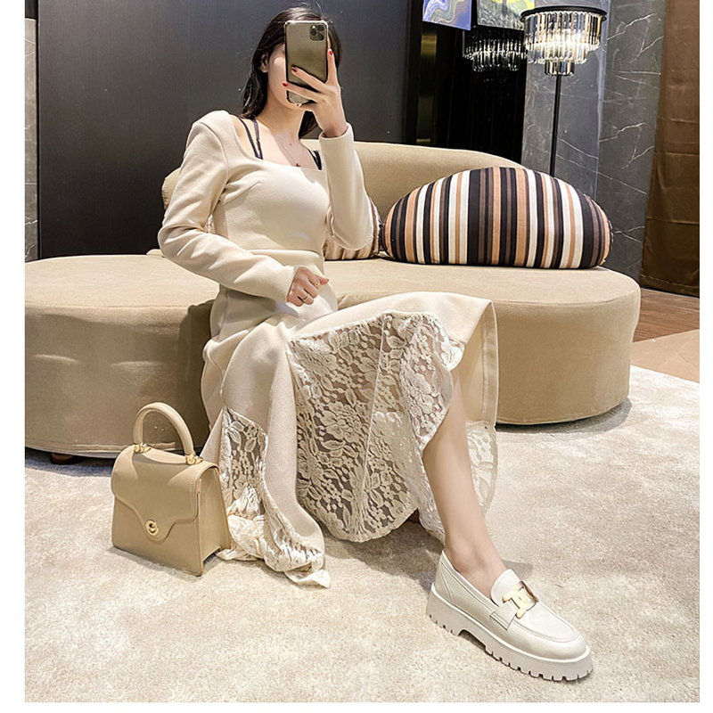Trendy thick-soled loafers with gold chain detail paired with a stylish lace dress and handbag, perfect for casual outings.
