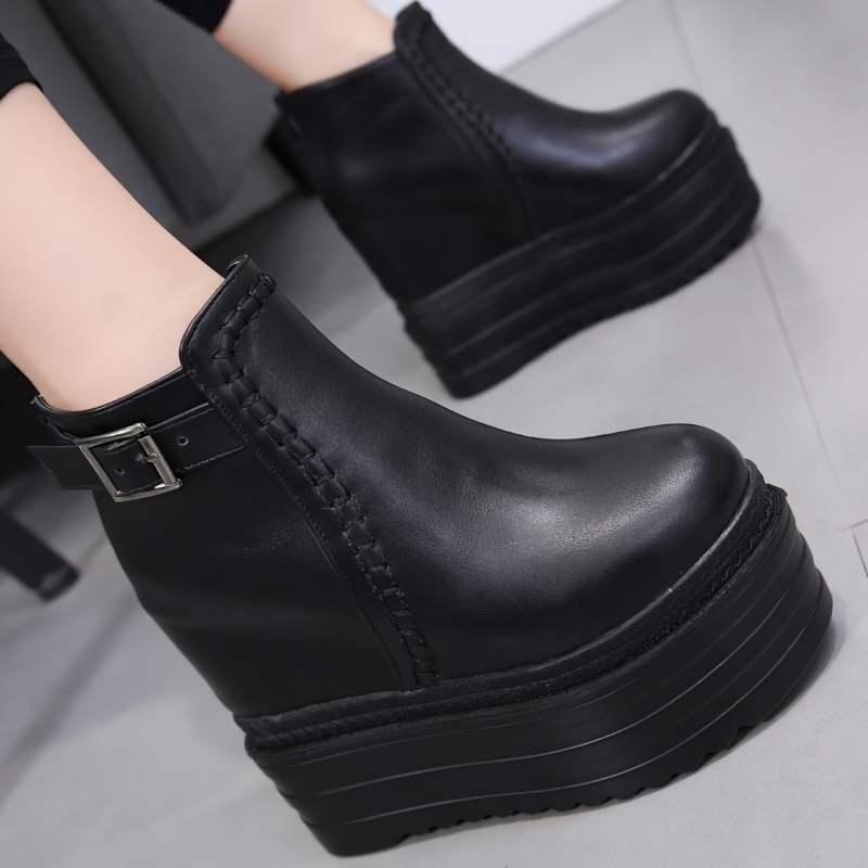 Trendy black high platform boots with zipper and ankle buckle, perfect for casual autumn fashion.