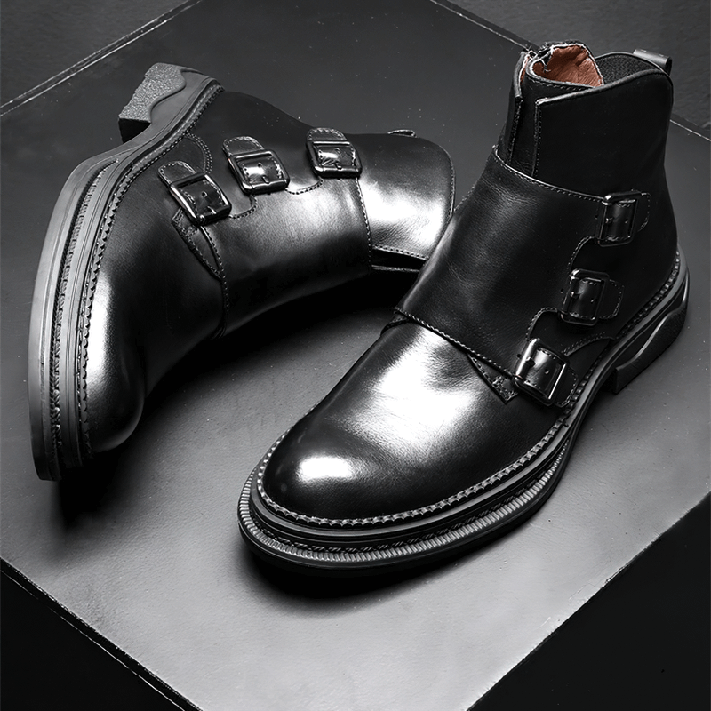 Trendy black leather ankle boots with buckles for men, perfect for casual and motorcycle looks.
