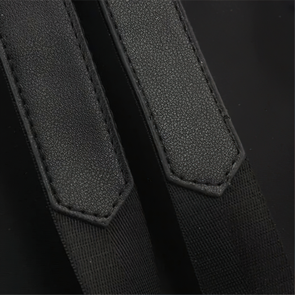 Close-up of the durable straps on a trendy women's casual Oxford backpack for added comfort and style.