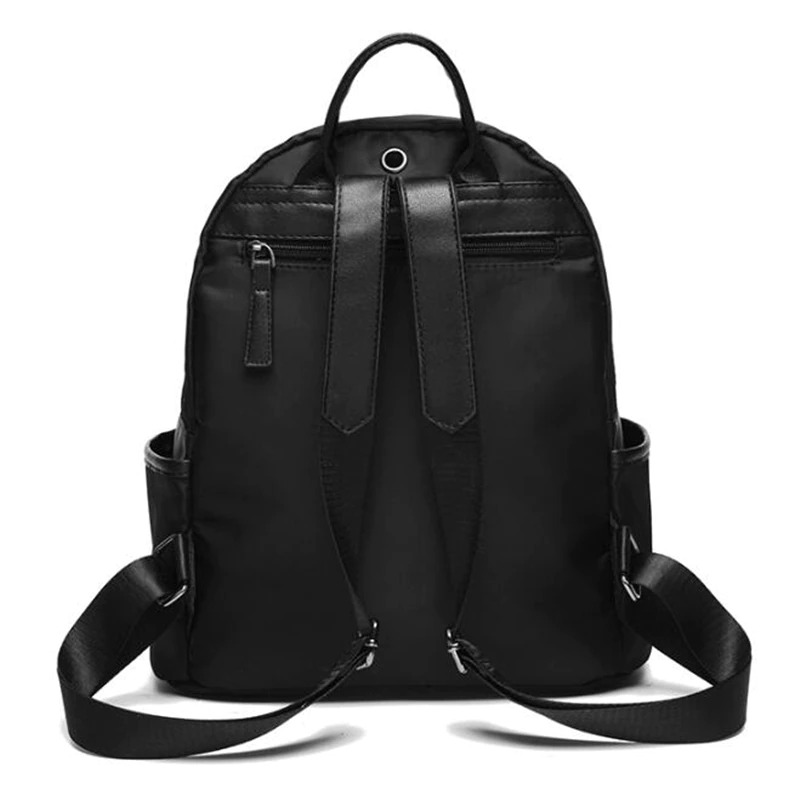 Stylish black women's Oxford cloth backpack with multiple pockets and adjustable straps for casual use.