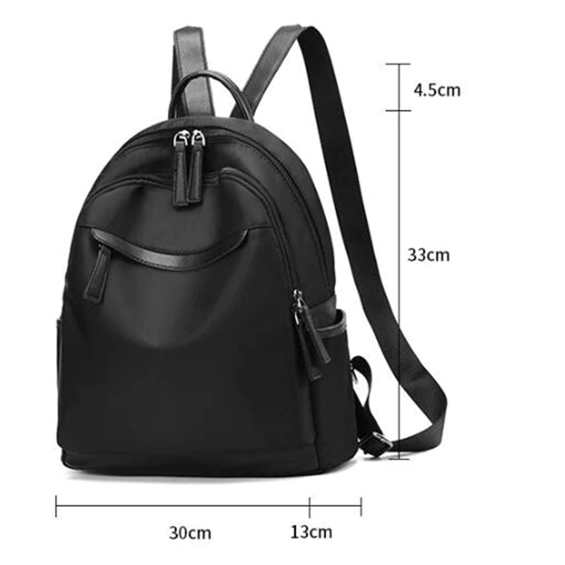 Trendy black oxford cloth backpack for women, featuring multiple pockets and a stylish casual design, ideal for everyday use.