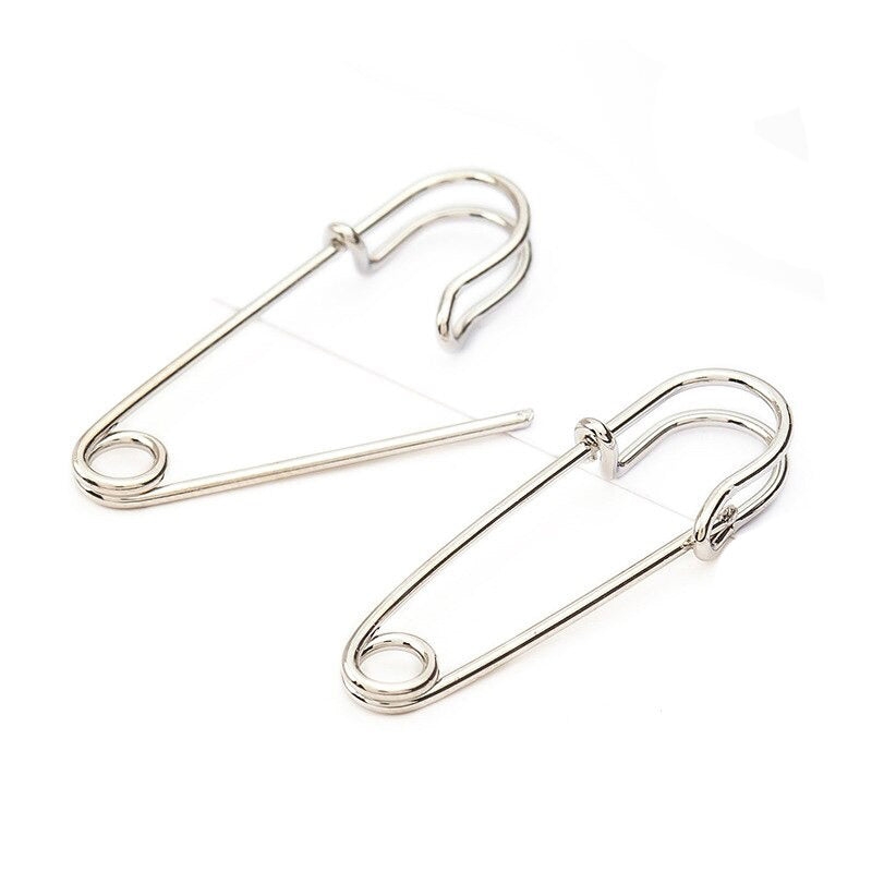 Stylish unisex punk rock safety pin earrings in silver, perfect alternative jewelry for any edgy look.