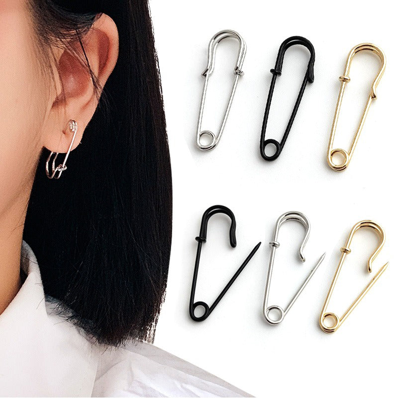 Trendy unisex punk rock safety pin ear hook earrings in black, silver, and gold. Modern alternative jewelry for any style.
