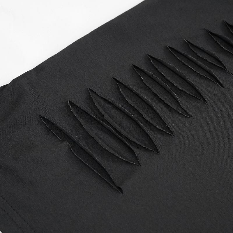 Close-up of ripped holes design on a black gothic men's hoodie, showcasing edgy style and modern cut features.