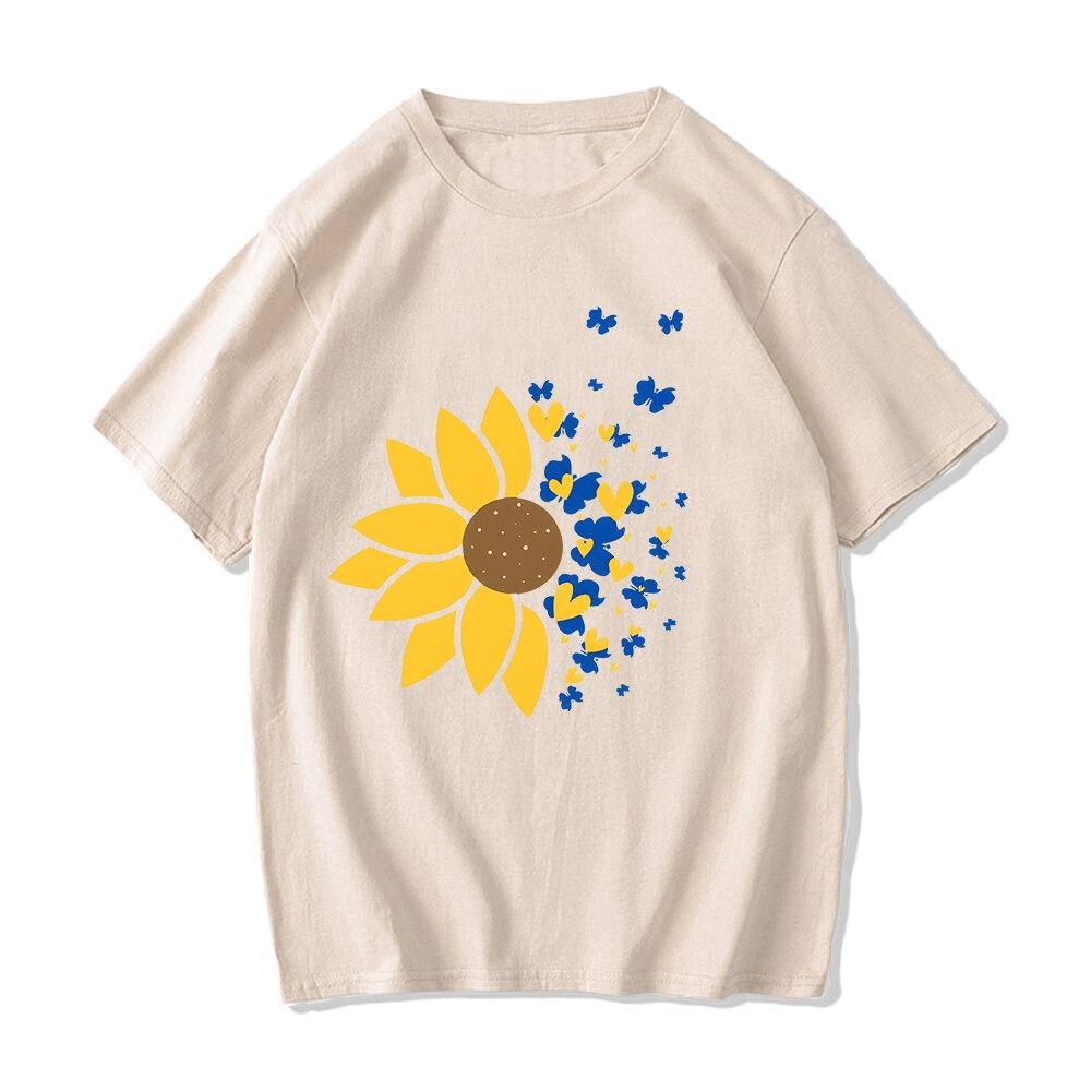 Unisex oversized beige t-shirt featuring vibrant Ukraine sunflower and butterflies print, casual cotton fashion.