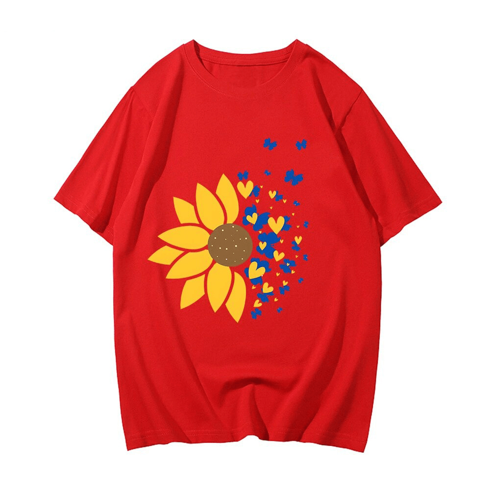 Red oversized t-shirt featuring a sunflower and colorful hearts, perfect for casual wear for men and women.