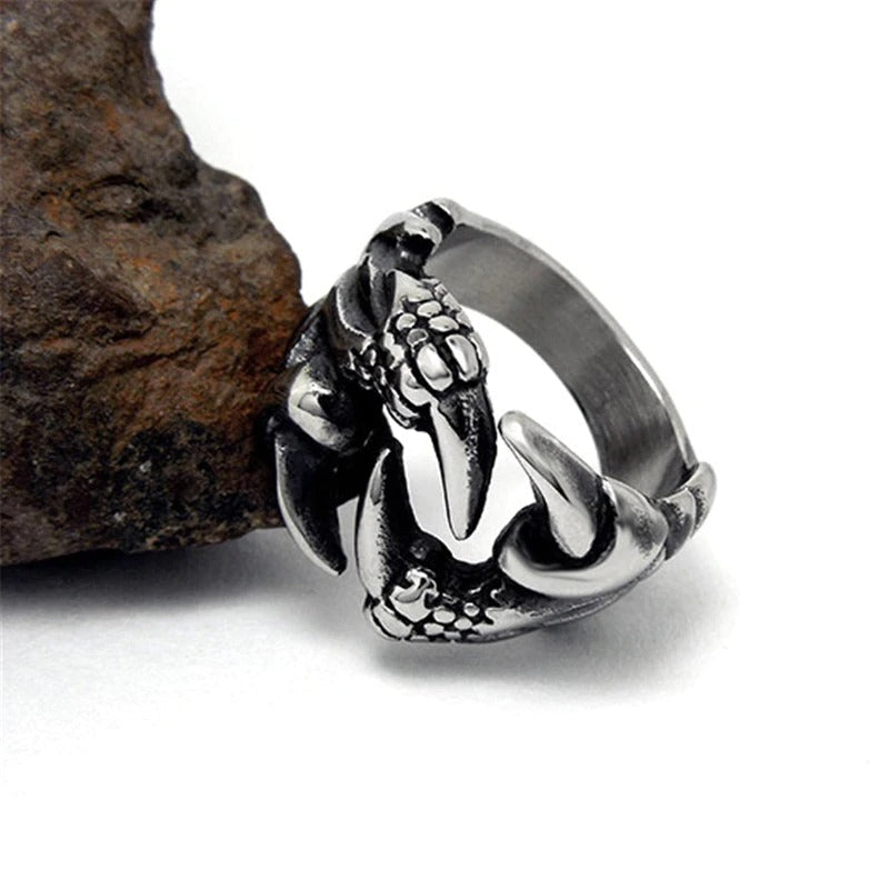 Unique dragon claw biker ring in stainless steel, perfect for alternative fashion and cosplay lovers.