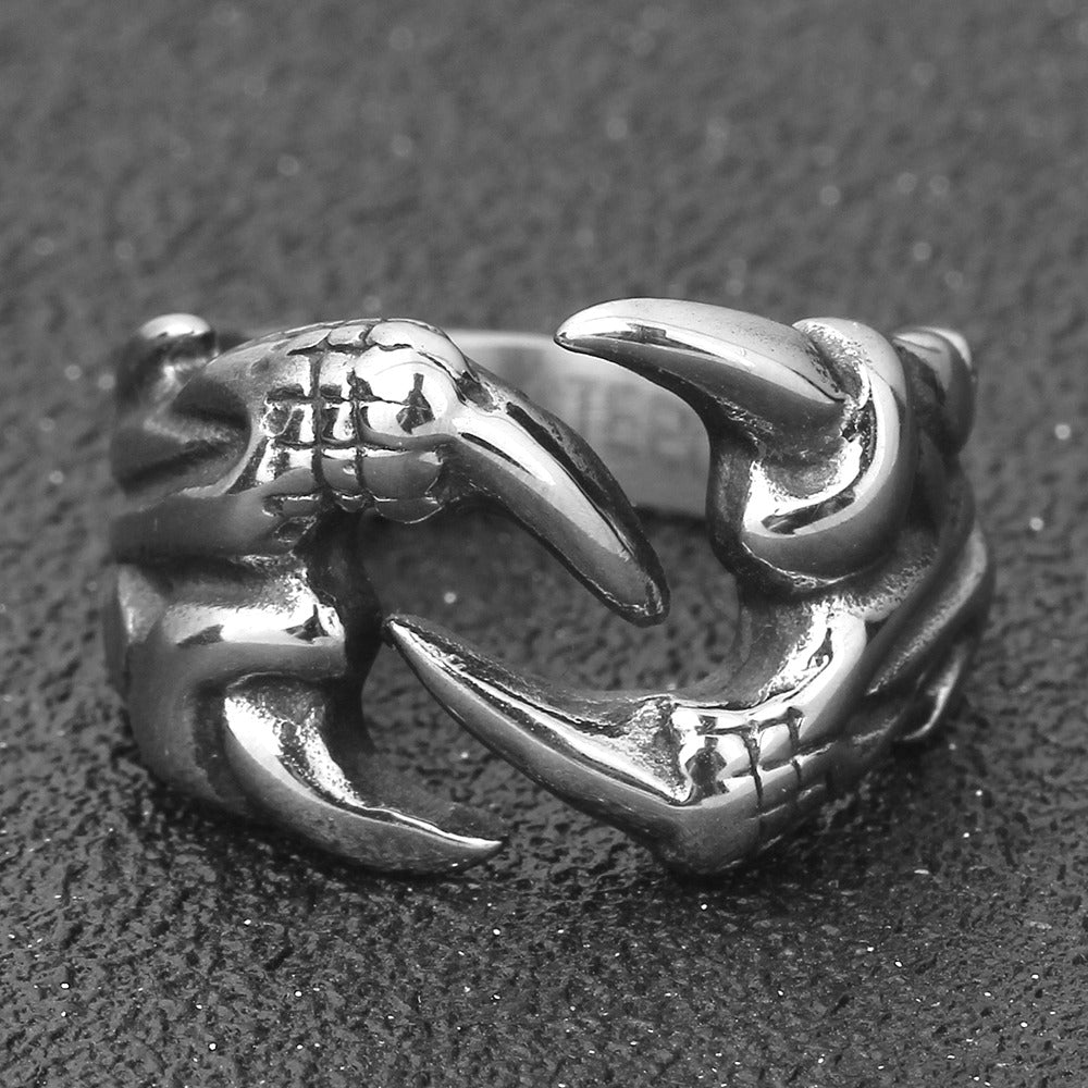Unique dragon claw biker ring in stainless steel, perfect for alternative fashion and cosplay enthusiasts.