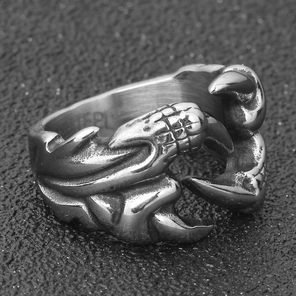 Unique dragon claw biker ring in stainless steel, perfect for alternative fashion and cosplay enthusiasts.