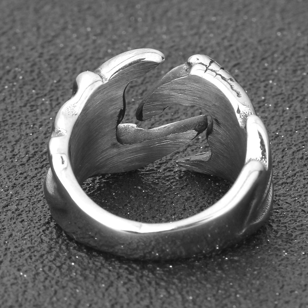 Unique dragon claw biker ring showcasing intricate stainless steel design, perfect for alternative fashion and cosplay.