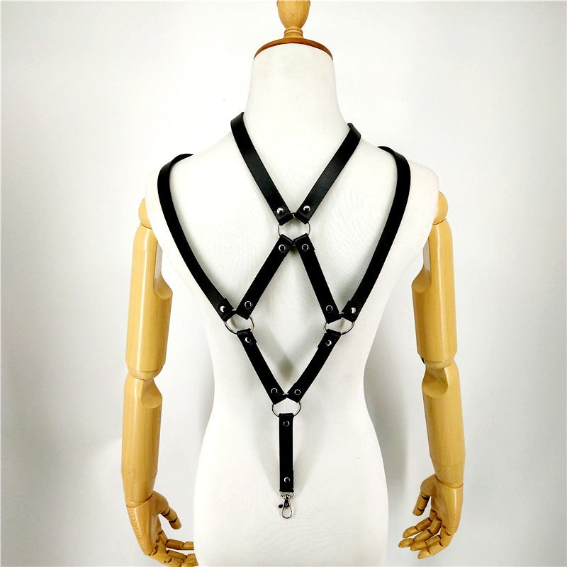 Men's adjustable faux leather harness on mannequin, featuring rings and rivets for gothic style.