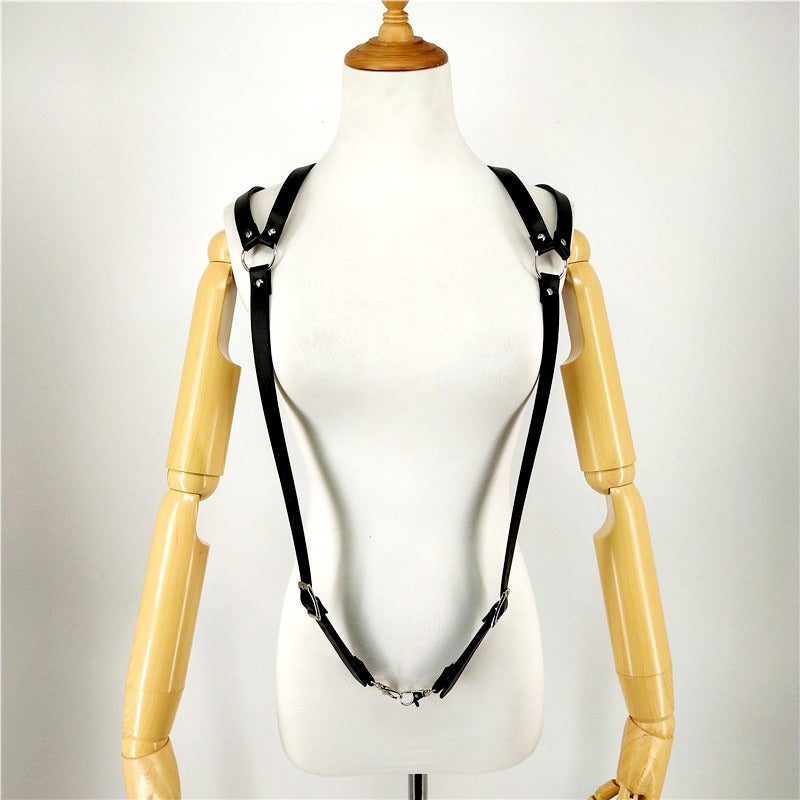 Men's adjustable black PU leather body harness with silver ring and rivets, perfect for a gothic style.