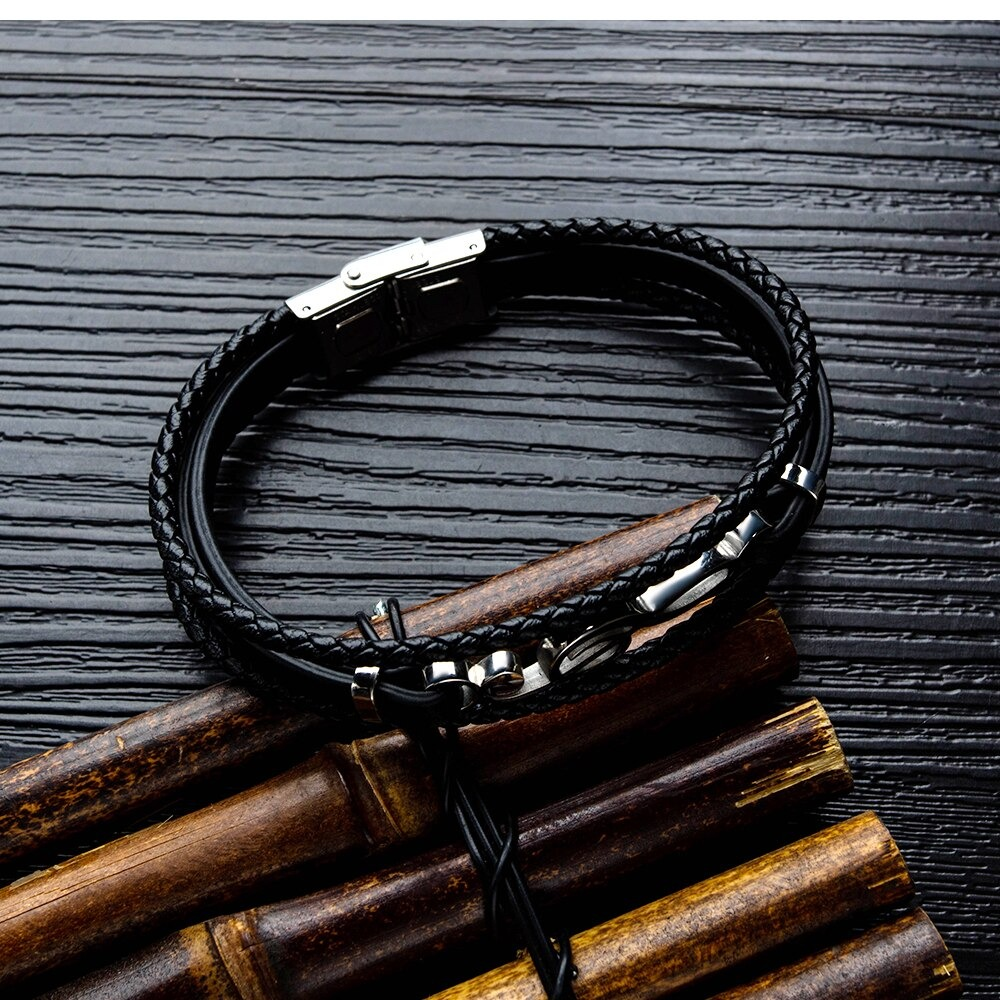 Stylish black PU leather bracelet with silver musical note charm, perfect for unisex casual wear.