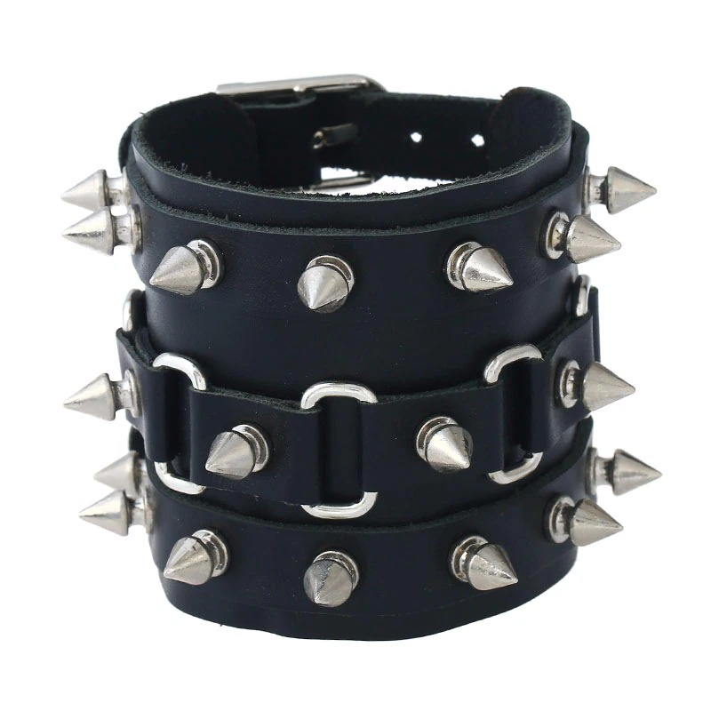Wide black leather cuff bracelet with silver spikes, perfect for punk rock style and unisex fashion.