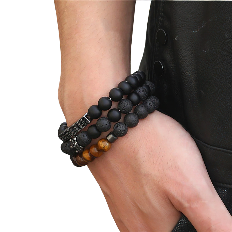 Stylish unisex bracelet stack with black matte onyx stone beads and vintage accents, perfect for alternative fashion.