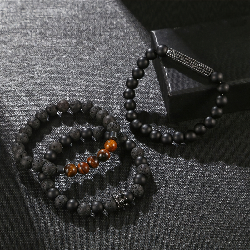Stylish unisex black matte onyx stone bracelet with unique designs and vintage accents.