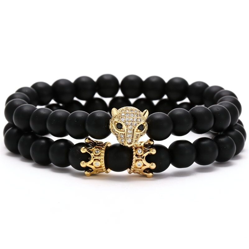 Unisex lava stone bead bracelet with beast head and crown - bold alternative jewelry style.