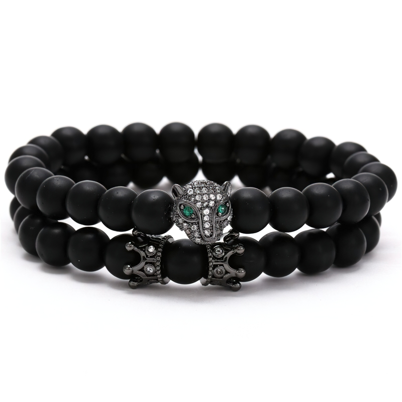 Unisex bracelet of black lava stone beads featuring a stylish beast head and crown, perfect for cool rock style jewelry.