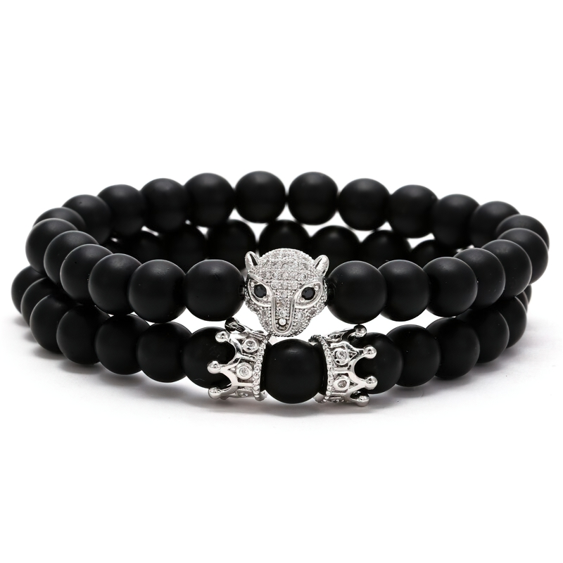 Unisex lava stone bracelet featuring a beast head and crown, perfect for a cool rock style accessory.