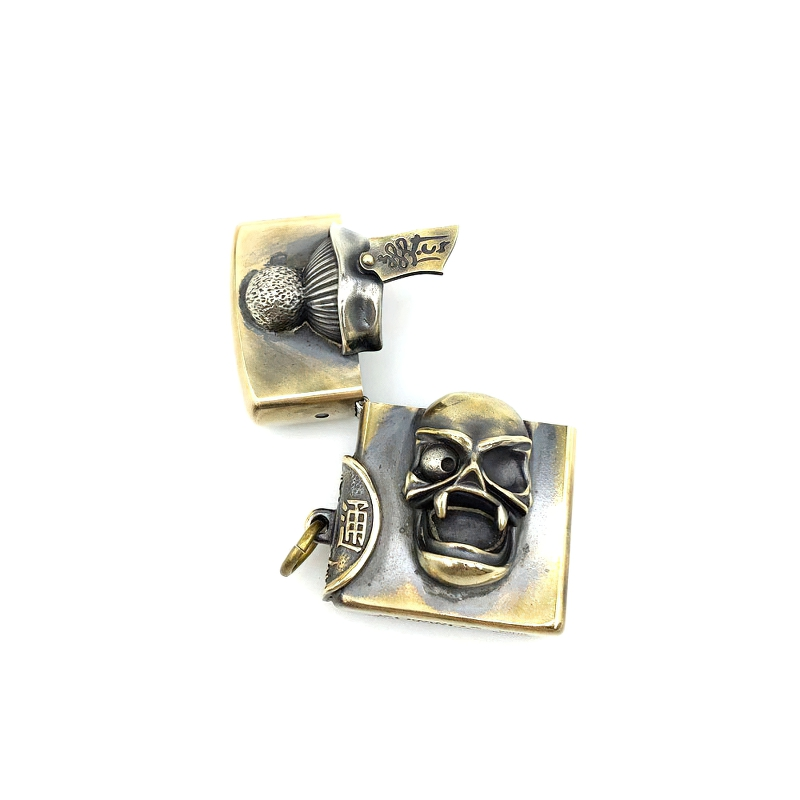 Unisex skull cap lighter case in brass, rock style accessory for collectors, featuring intricate design and quality craftsmanship.