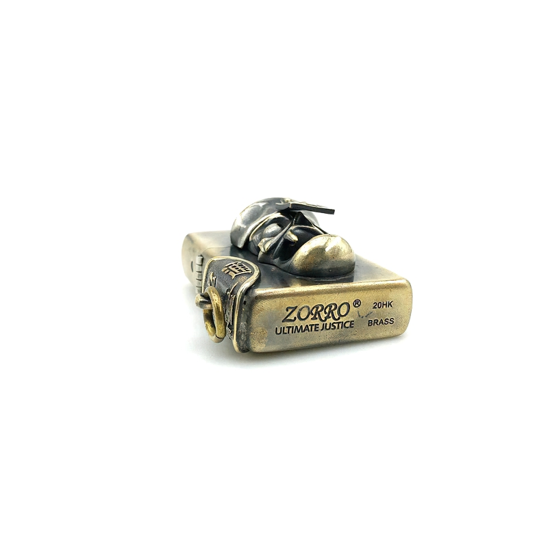 Zorro lighter case in brass with detailed design, ultimate justice theme, perfect for collectors and fans of unique rock accessories.