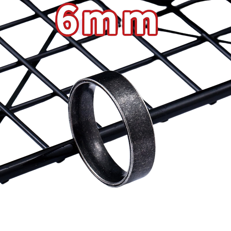 Unisex classic stainless steel ring displayed on a grid surface, perfect casual jewelry for men and women.