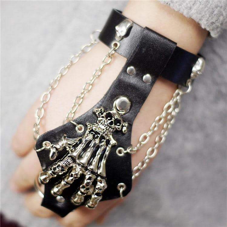 Unisex Gothic skeleton hand glove wristband with chains, perfect for rock concerts and cosplay events.