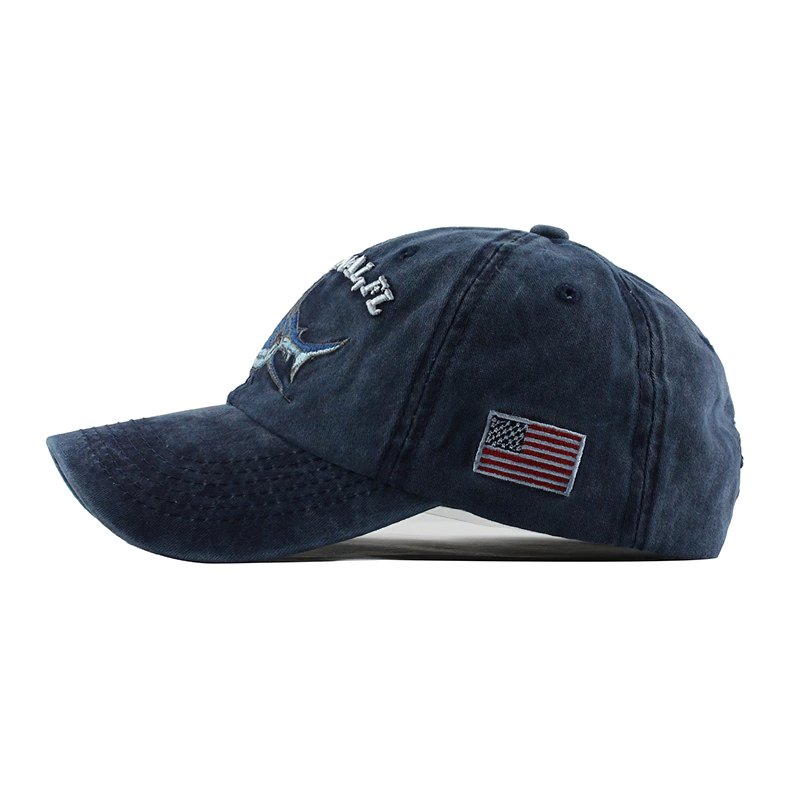 Unisex navy baseball cap with shark embroidery and American flag detail, perfect casual accessory for stylish sun protection.