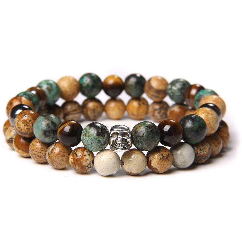 Unisex natural stone bangle with skull insert, stylish casual accessory for men and women, available in various colors.
