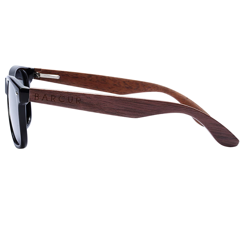 Unisex fashion sunglasses with a wooden frame and anti-reflective lenses, perfect stylish accessory.