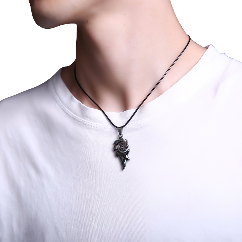 Unisex rock style stainless steel dragon flame pendant worn by a person, showcasing a cool vintage accessory.