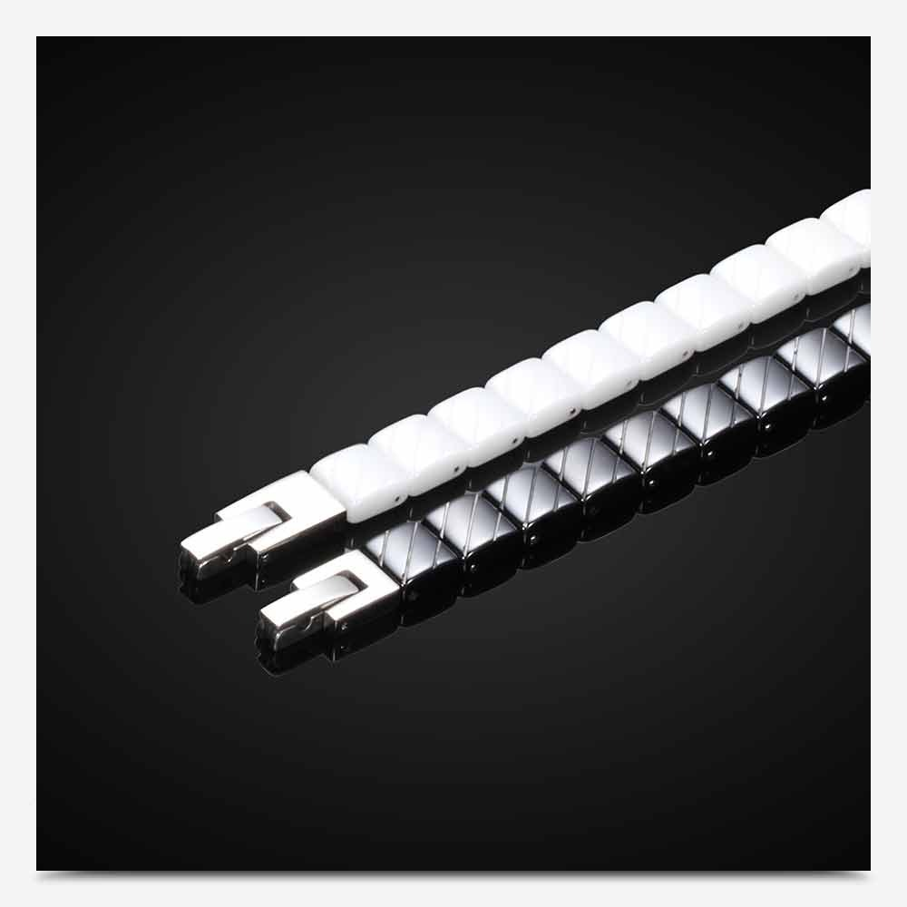 Unisex stainless steel bracelet in black and white colors showing toggle-clasps and stylish design.