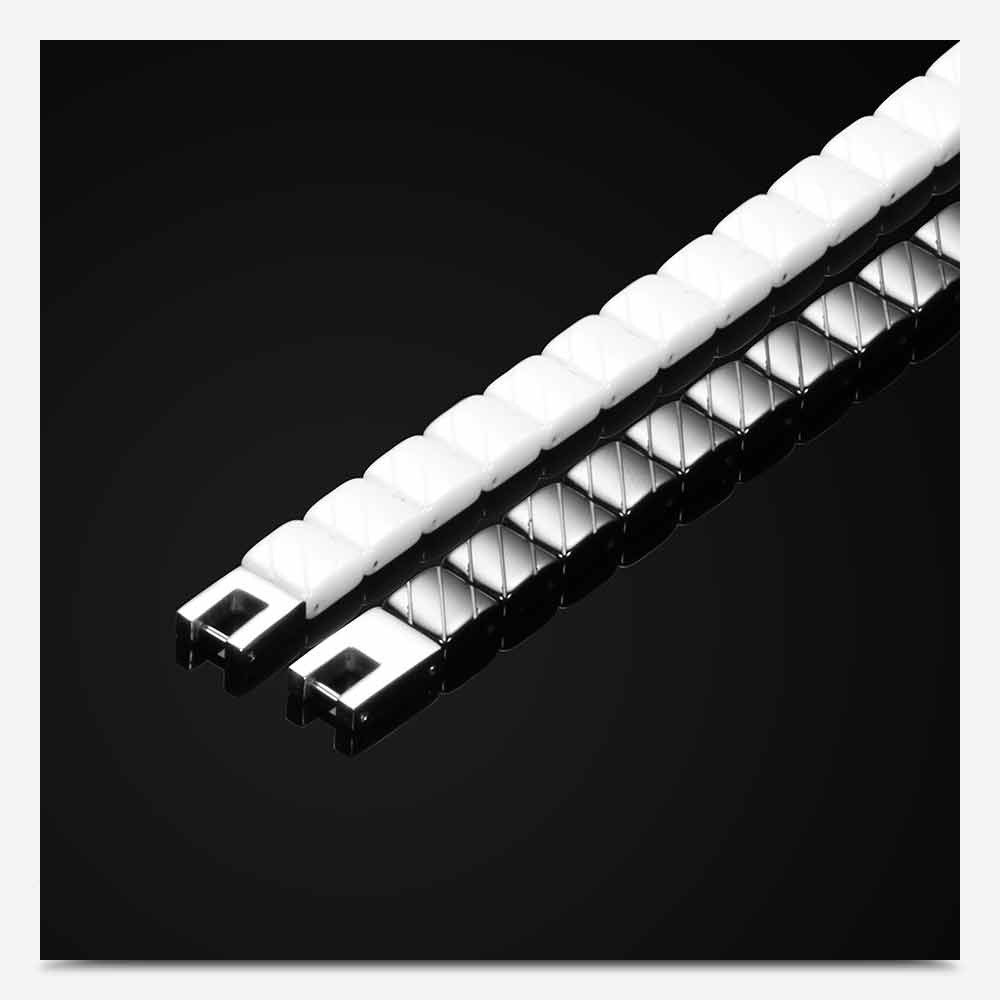 Close-up of unisex stainless steel bracelet in black and white, showcasing its trendy toggle clasps and sleek design.