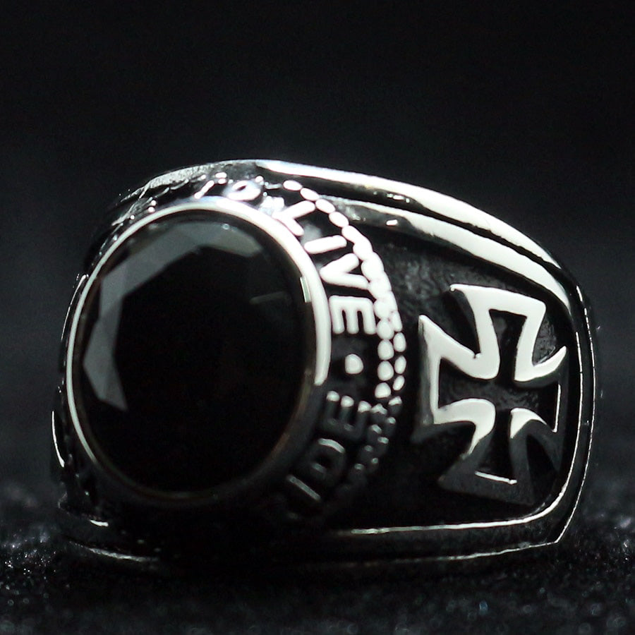 Unisex stainless steel biker ring with black stone and cross, perfect for adding rugged style to any jewelry collection.
