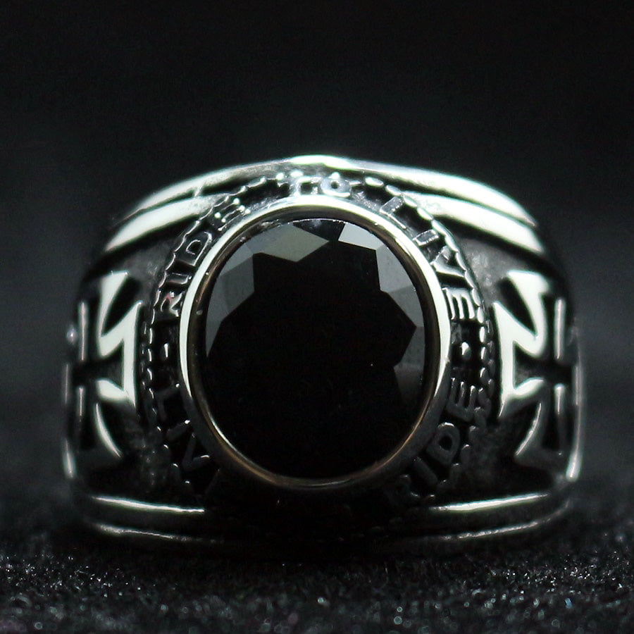 Unisex stainless steel classic biker ring featuring a black stone and crosses, perfect for bikers and jewelry lovers.