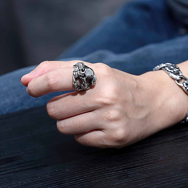Unisex gothic stainless steel ring featuring a skull held by a dragon's paws, perfect for rock and biker styles.