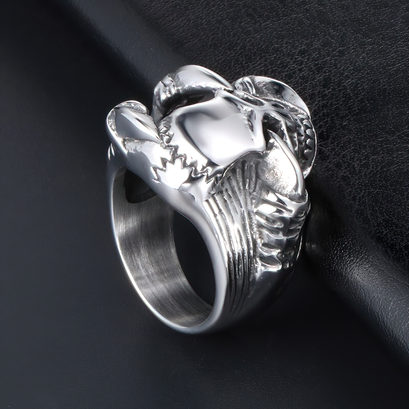 Unisex stainless steel gothic ring featuring a skull held by dragon paws, perfect for rock and biker styles.