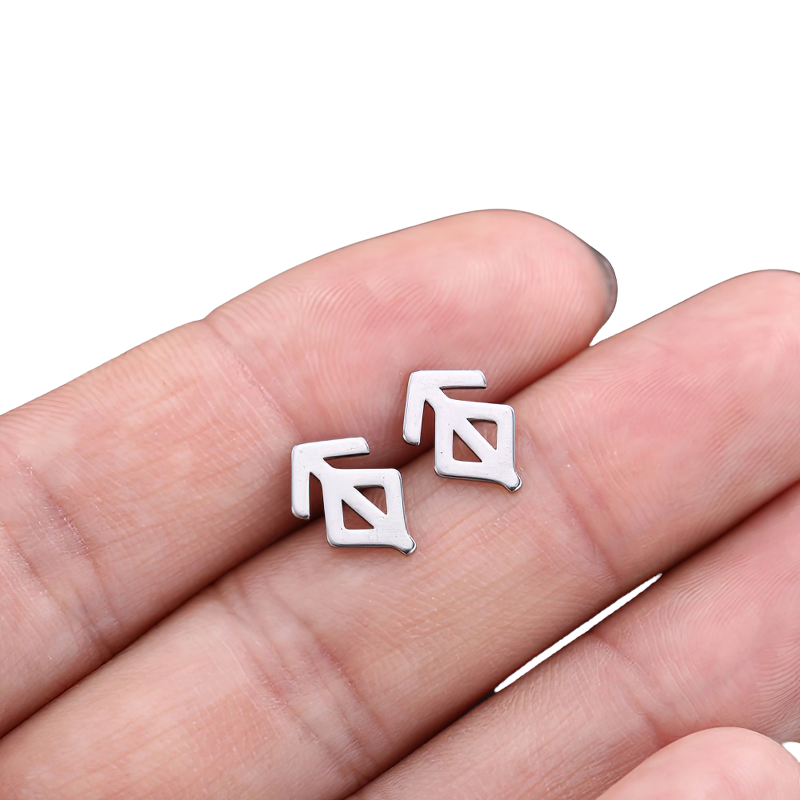 Unisex stainless steel vintage gothic earrings displayed on a hand, featuring a unique geometric design.