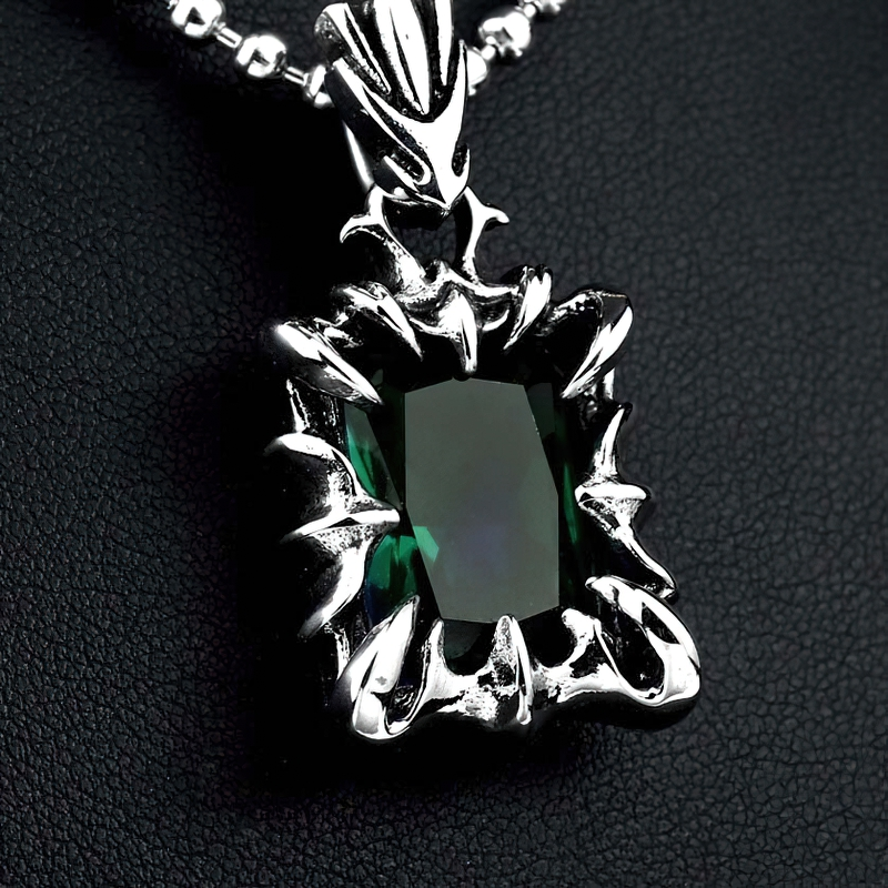 Gothic unisex stainless steel pendant with striking green stone centerpiece, perfect casual fashion accessory.